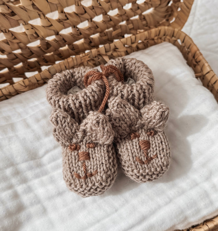 Baby beige brown bunny ear booties for a new baby.