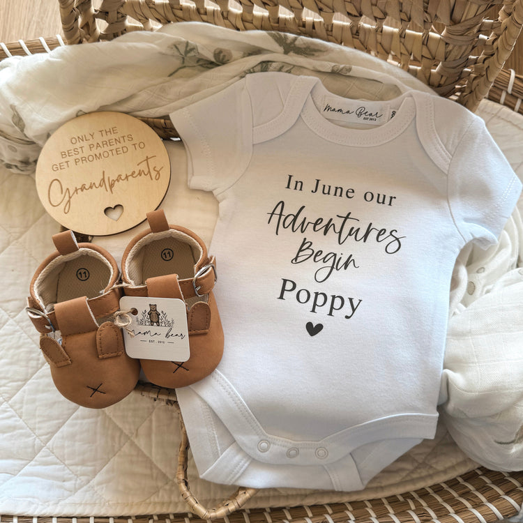 Baby announcement onesie to Dad / Poppy. Onesie saying "In June our Adventures Begin Poppy" Custom onesie example.