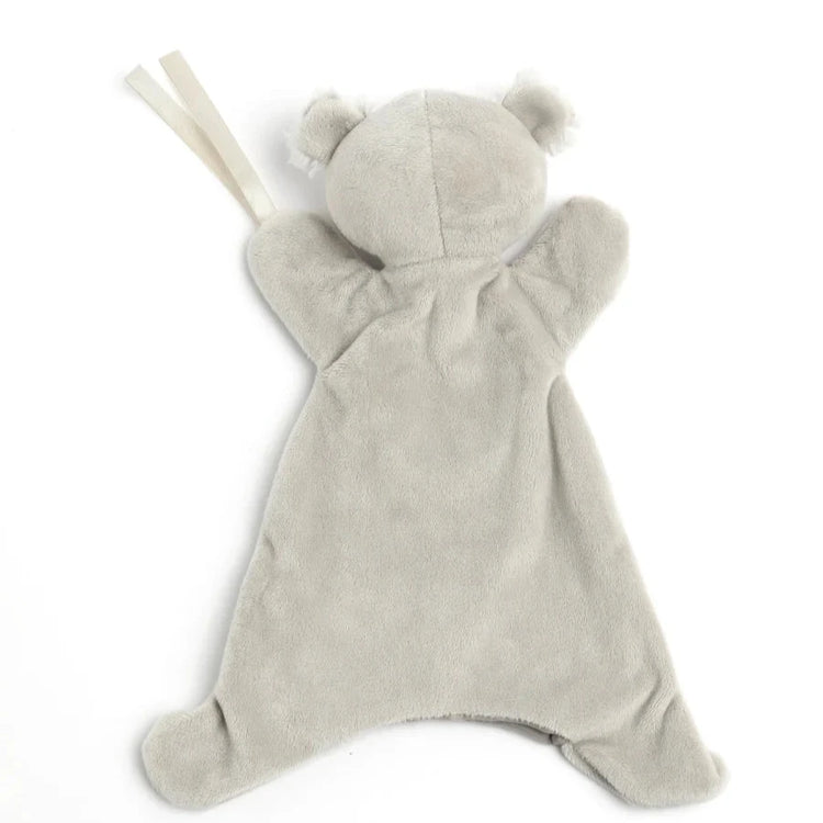 White background, flat lay of grey koala baby comforter. Two pieces of white ribbon attached to koalas paw, which is used to secure baby dummy.