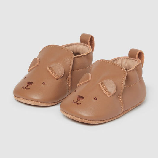 Pair of brown baby shoes with bear face design. Perfect baby shower or newborn gift