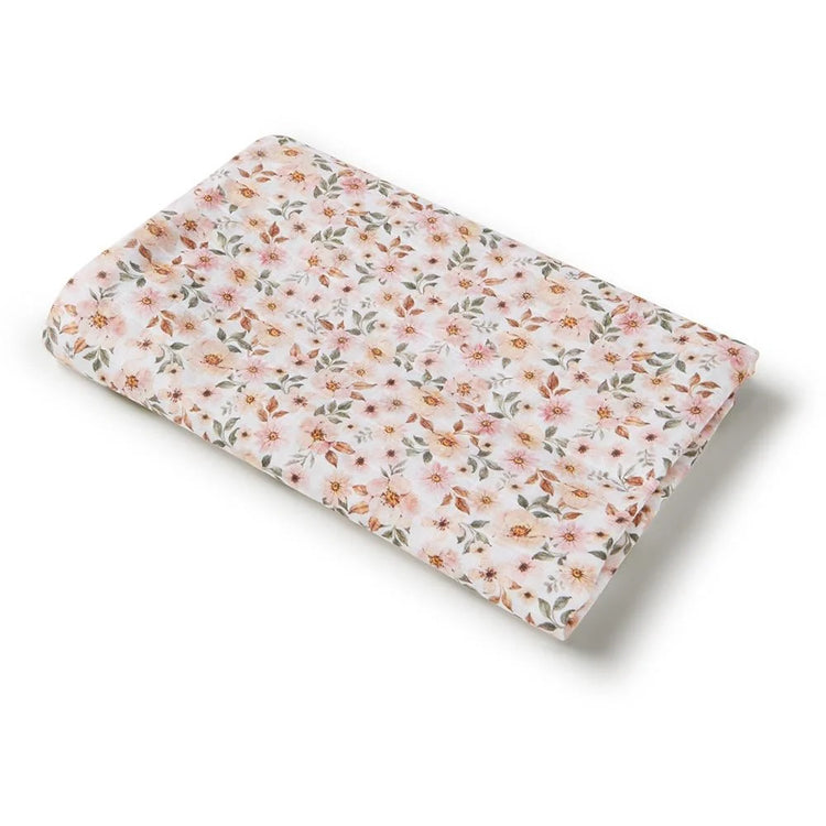 Floral-patterned baby swaddle on a white background