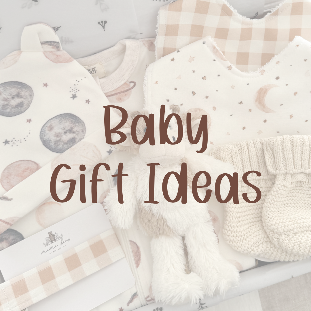 Neutral baby gift ideas, baby clothing, bib, soft toy, newborn essentials.