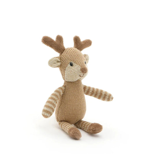 Knitted toy reindeer on a white background