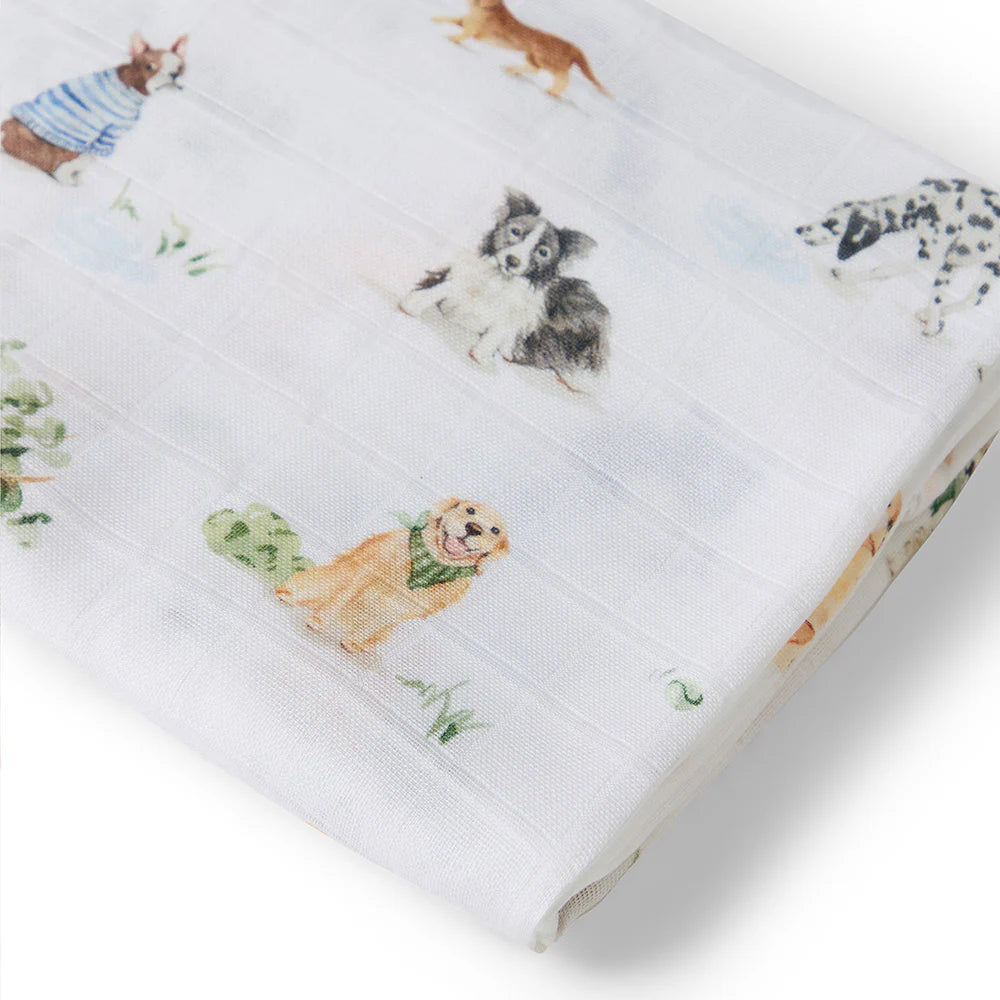 Baby blanket with dog illustrations on a white background