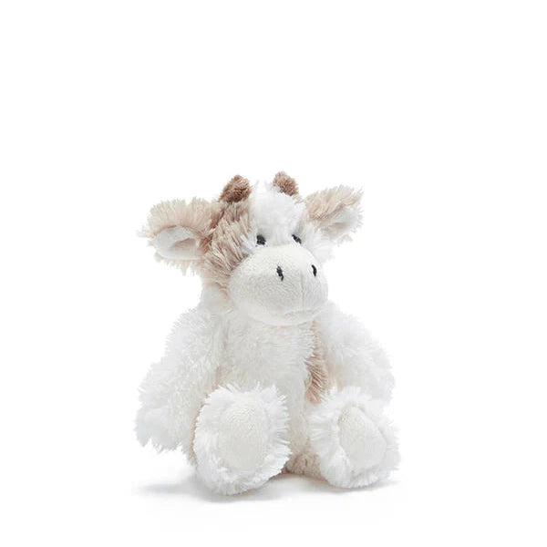 A plush toy resembling a cow, primarily in white and beige colors, designed for babies.