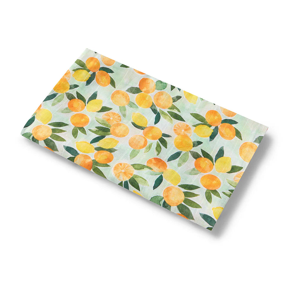 Lemon and oranges illustrated on a baby muslin wrap with pale green background 