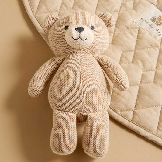 Light brown knitted teddy bear