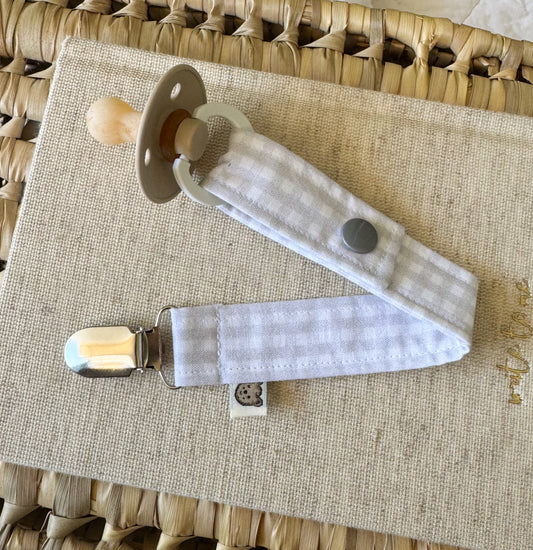 A material dummy clip in light grey and white gingham